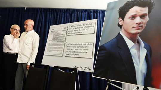 Irina and Viktor Yelchin at a news conference announcing lawsuit against Fiat Chrysler.