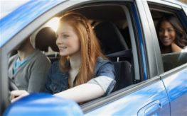 young teen driving a car