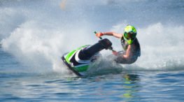 person operating a jet ski on the water