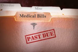 file folder with past due medical bills