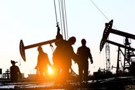 workers on texas oil drilling work site