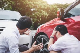 Two Drivers Arguing After A Car Accident