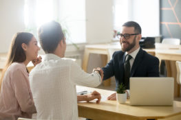 man shaking lawyer's hand