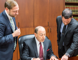 Picture of three McAllen Injury lawyers at Herrman & Herrman