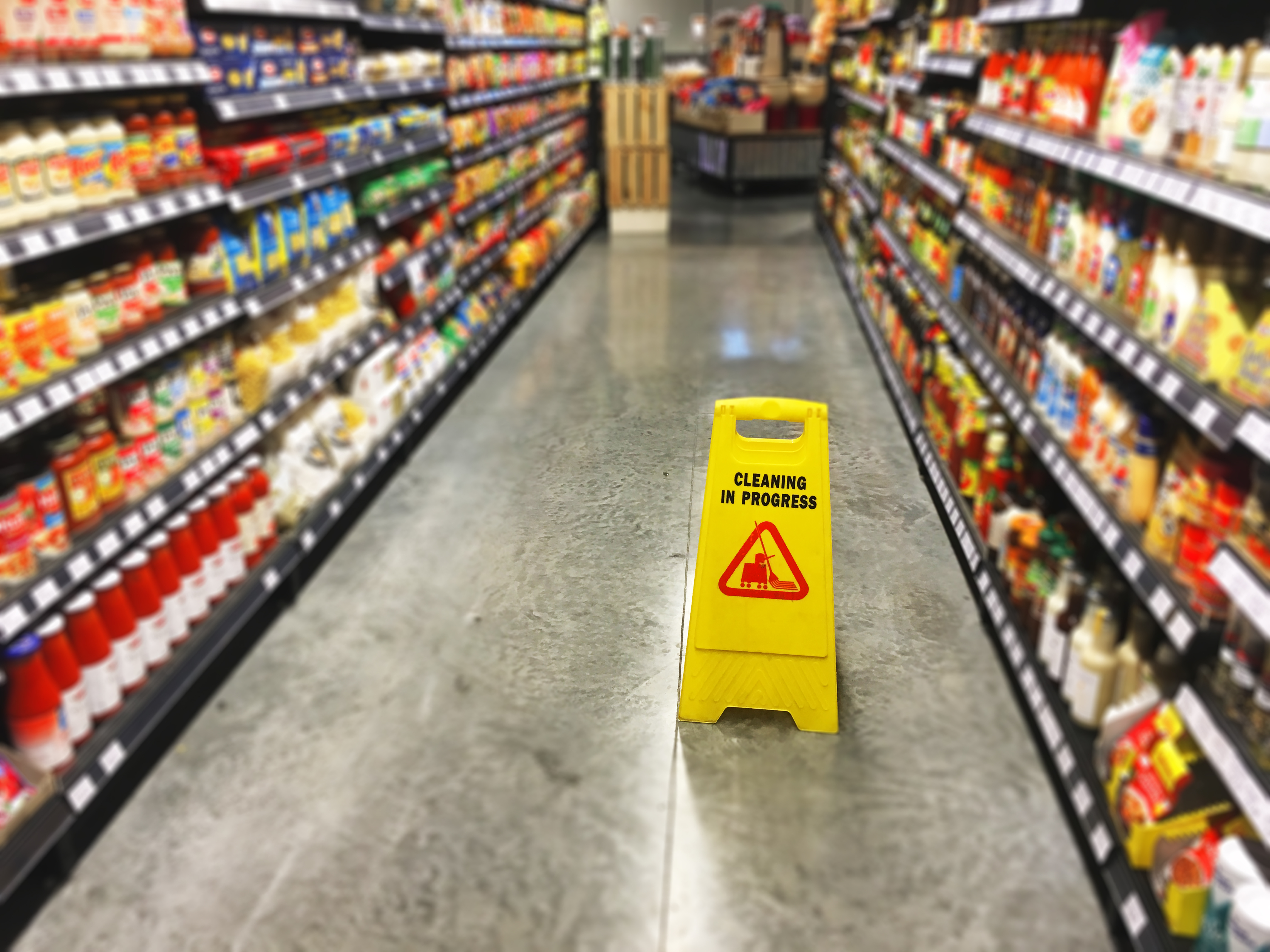 A cleaning in progress sign to avoid injuries on their premises