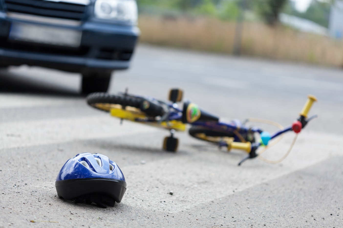 bicycle and helmet on the road after accident