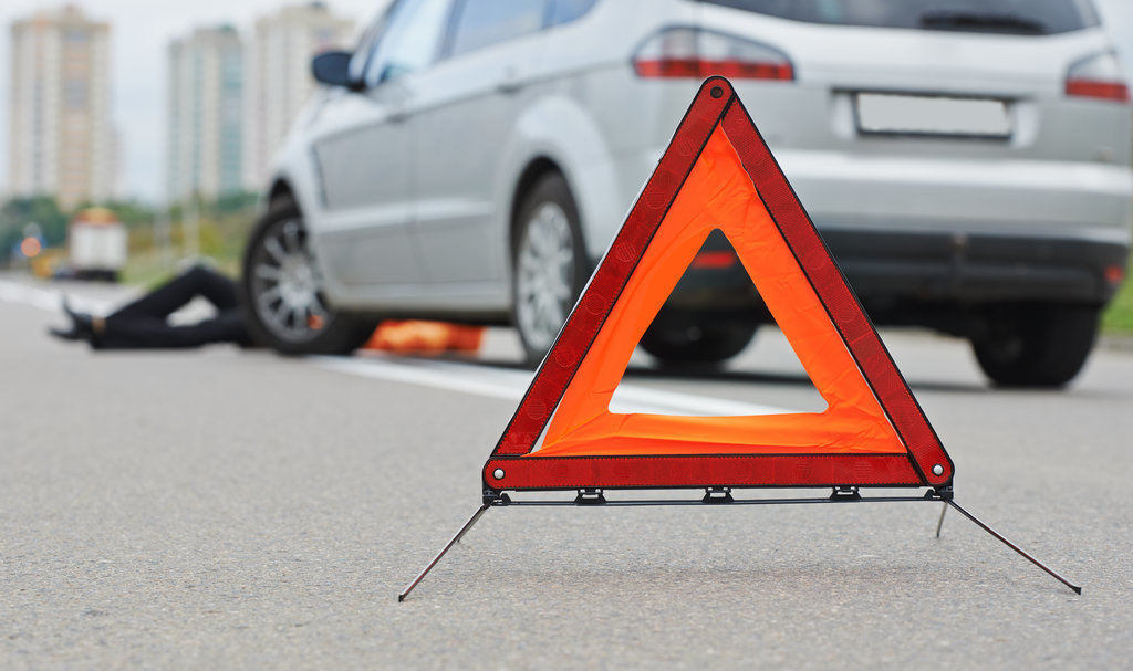 car triangle warning due to pedestrian accident