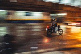 Time Lapse Image of a Person Riding a Motorcycle at Night