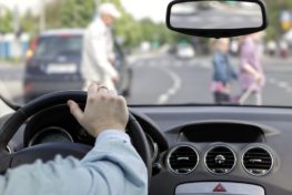 pedestrians about to get hit by a car