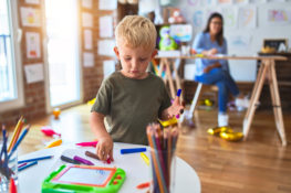 A child playing in a daycare