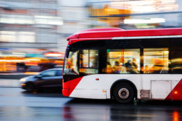 picture of a bus in city traffic in motion blur