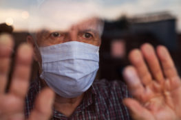 elder man isolated from the COVID-19 at a nursing home