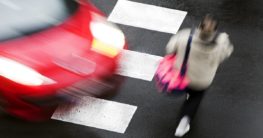 a car about to hit a pedestrian