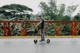 man riding e-scooter in San Antonio