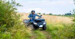 man riding an ATV