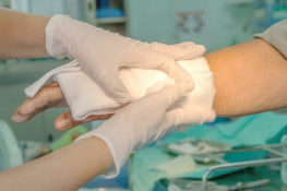 Burn injuries being bandaged at hospital