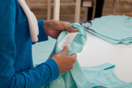 woman checking a clothe tag